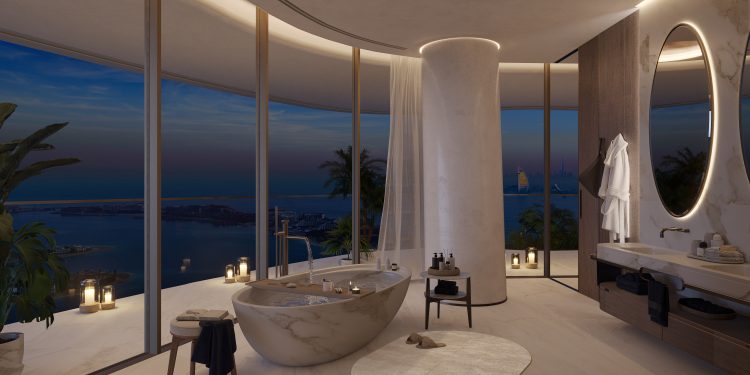 Luxurious bathroom at Como Residences with large floor-to-ceiling windows overlooking a scenic waterfront at dusk. Features an elegant freestanding marble bathtub, a round mirror above a sleek vanity, a bathrobe on a hook, and ambient candle lighting creating a serene atmosphere. | RealEstateMarket
