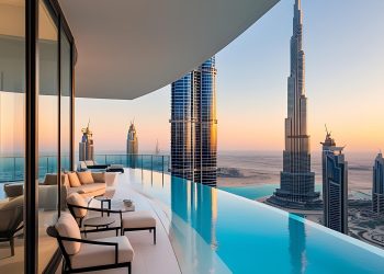 A luxurious balcony with a curved infinity pool overlooks skyscrapers, including the Burj Khalifa, at sunset in a modern cityscape. Lounge chairs sit by the pool, and glass walls reflect the urban skyline. | RealEstateMarket